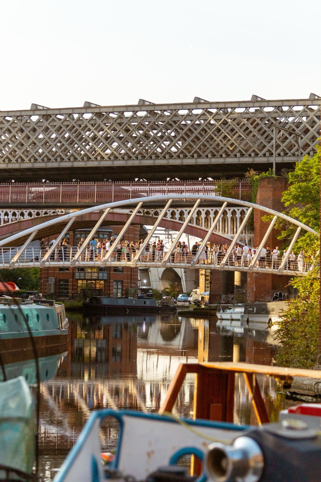 Merchants’ Bridge over the Castlefield canal basin in Manchester, with narrowboats below
